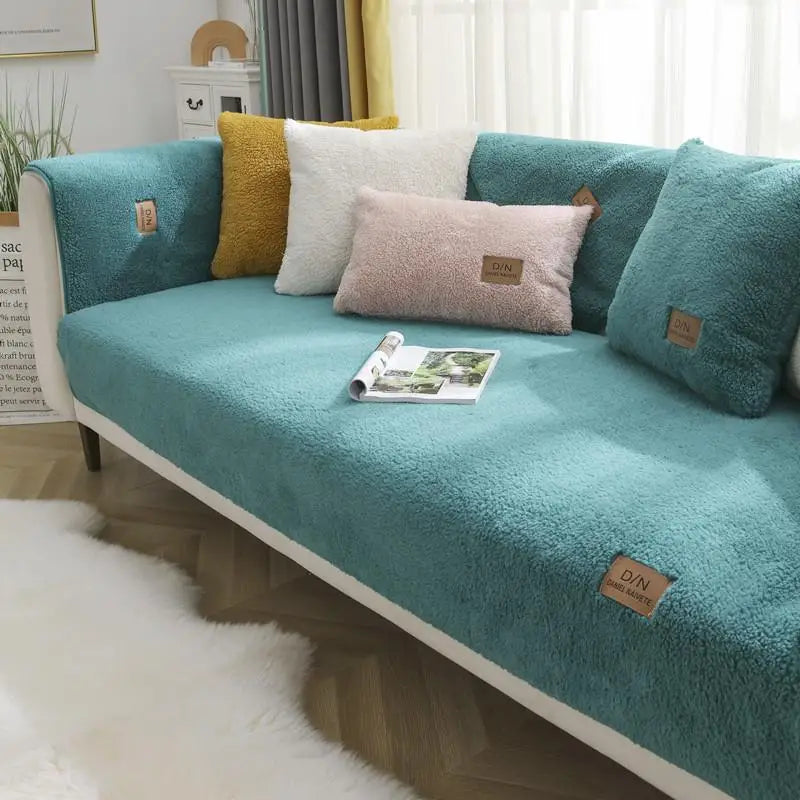 Underside view of the non-slip backing on a waterproof sherpa fleece sofa cover, ensuring it stays firmly in place.