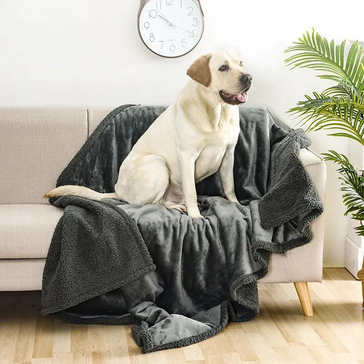 Cozy sherpa pet blanket, water-resistant, protects furniture from dog & cat fur. Washable & comfortable.