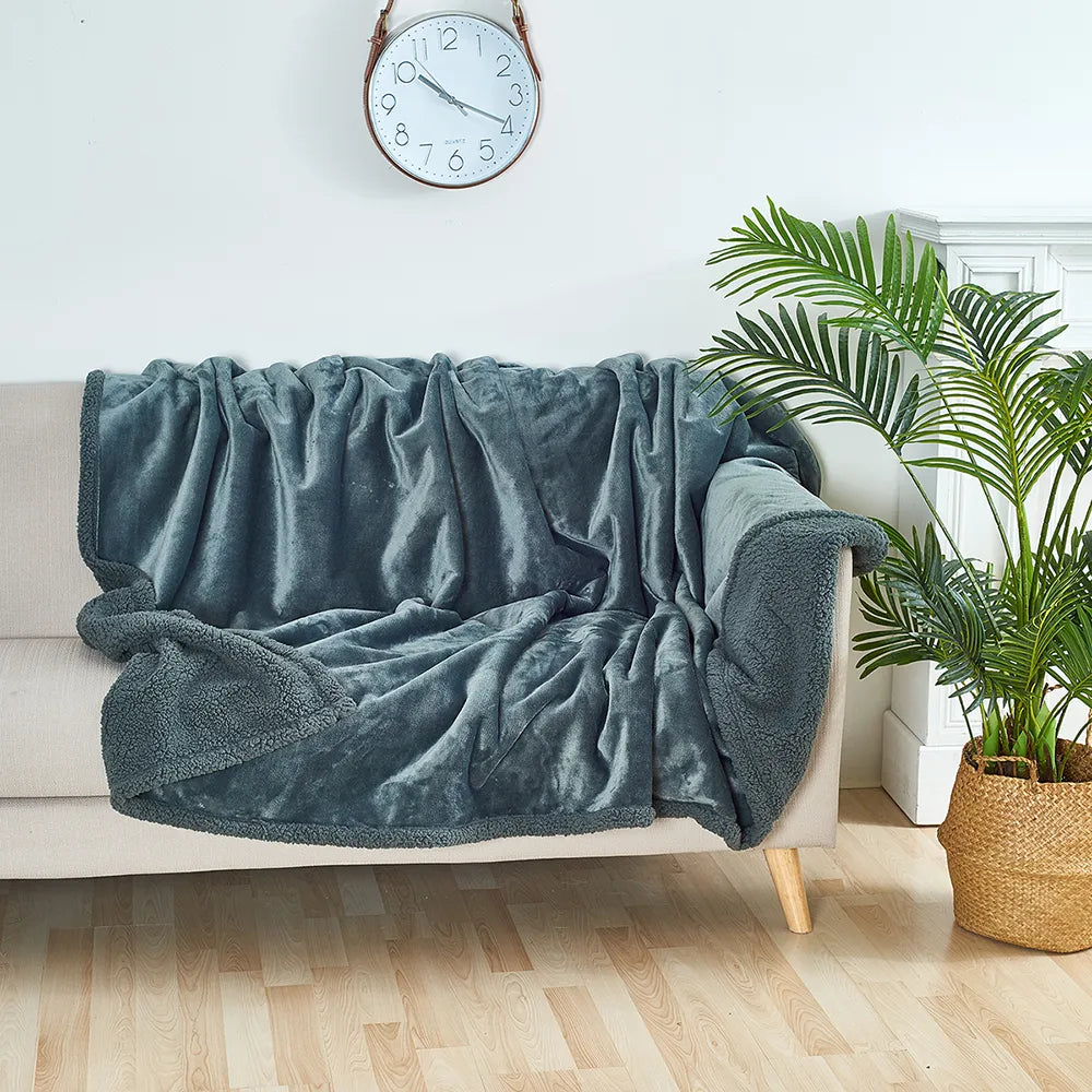 Stylish, washable pet blanket with sherpa for furniture. Water-resistant dog & cat cover, enhances home decor.