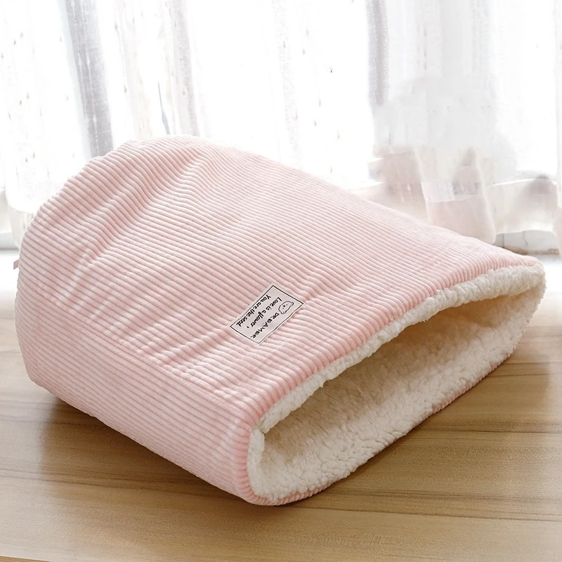 Soft SnowPaws winter warming pet bed for cats. Cozy, washable feline accessory for ultimate comfort & warmth.