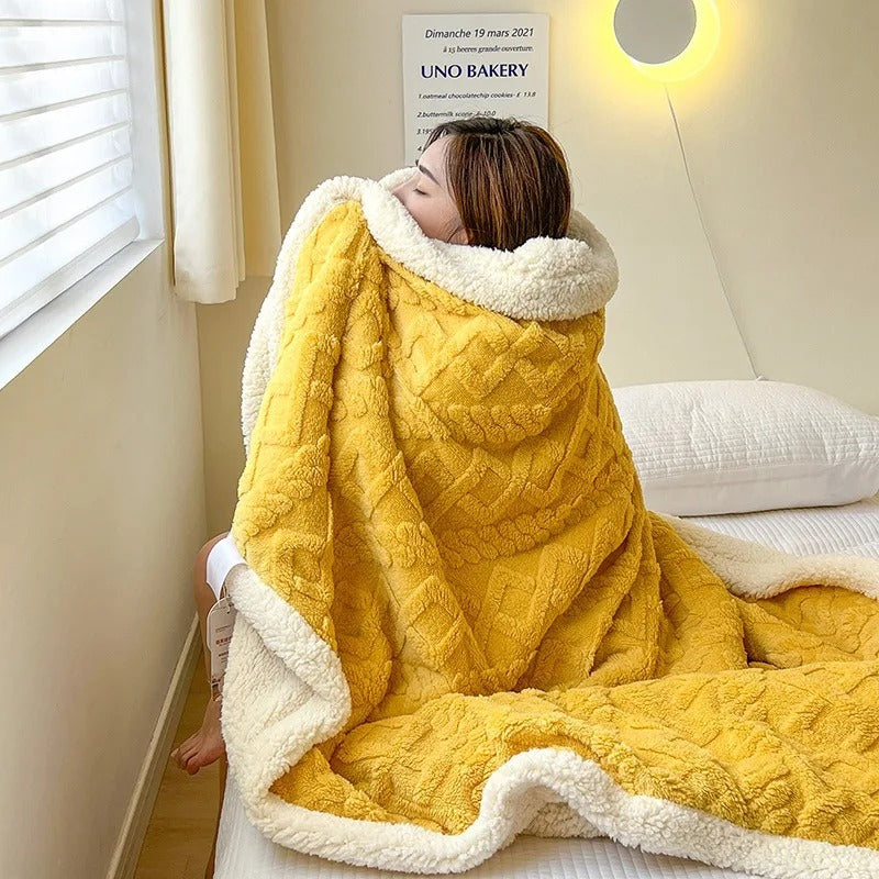 Close-up of a plush, thick winter blanket texture, highlighting its softness and warmth