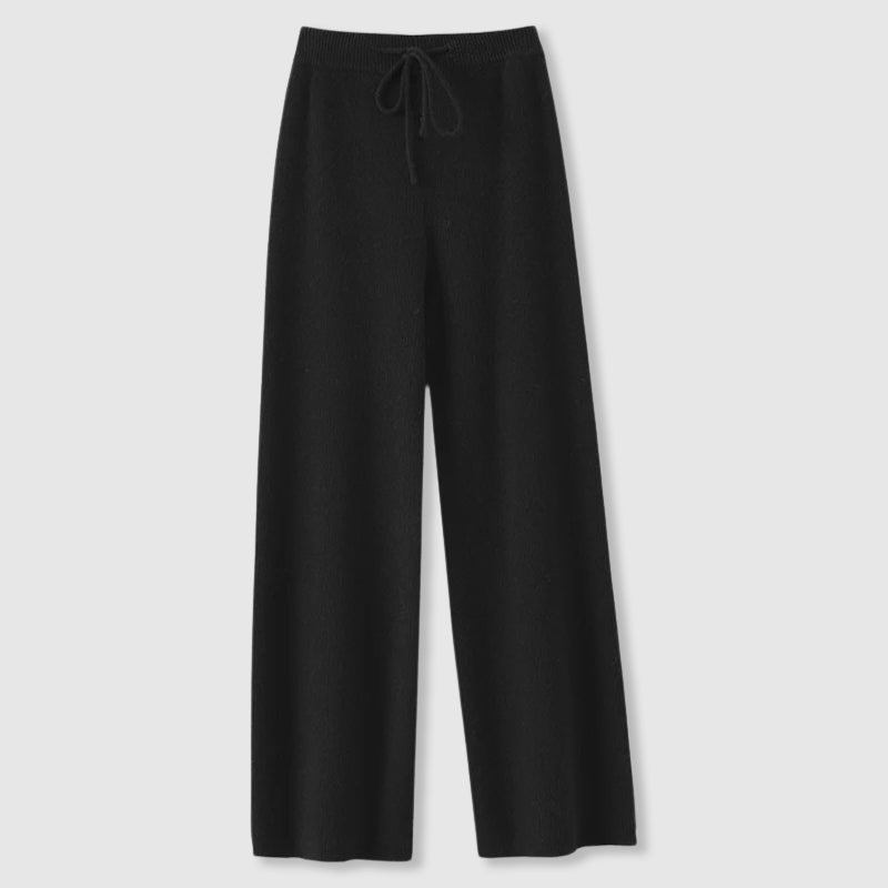 Soft ivory wide leg knit pants for women, high-waisted and comfortable, great for winter lounging.