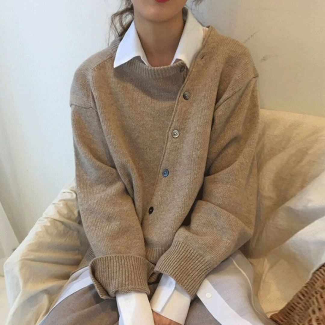 Cozy women's button-front knit winter sweater in a warm, neutral shade, perfect for fall fashion.