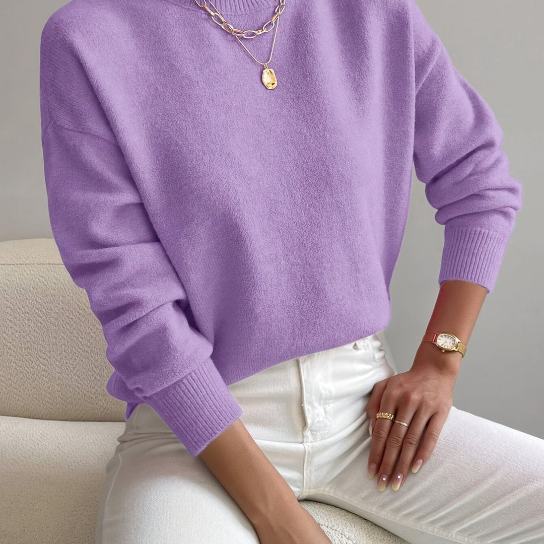 Casual high neck knit jumper for ladies, cozy long sleeve pullover for everyday winter style.