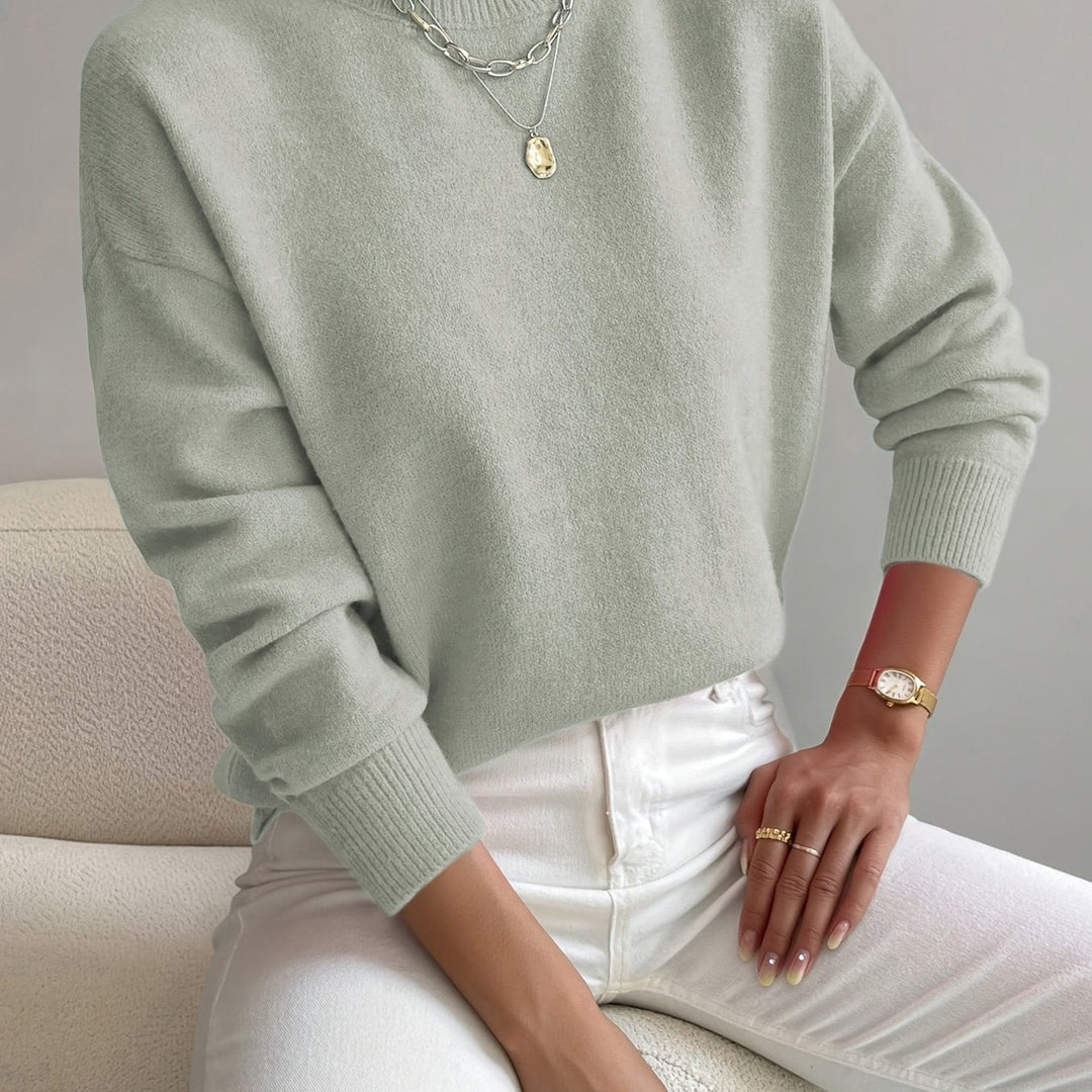Ideal layering women's high neck knit jumper, warm long sleeve pullover for winter outfits.