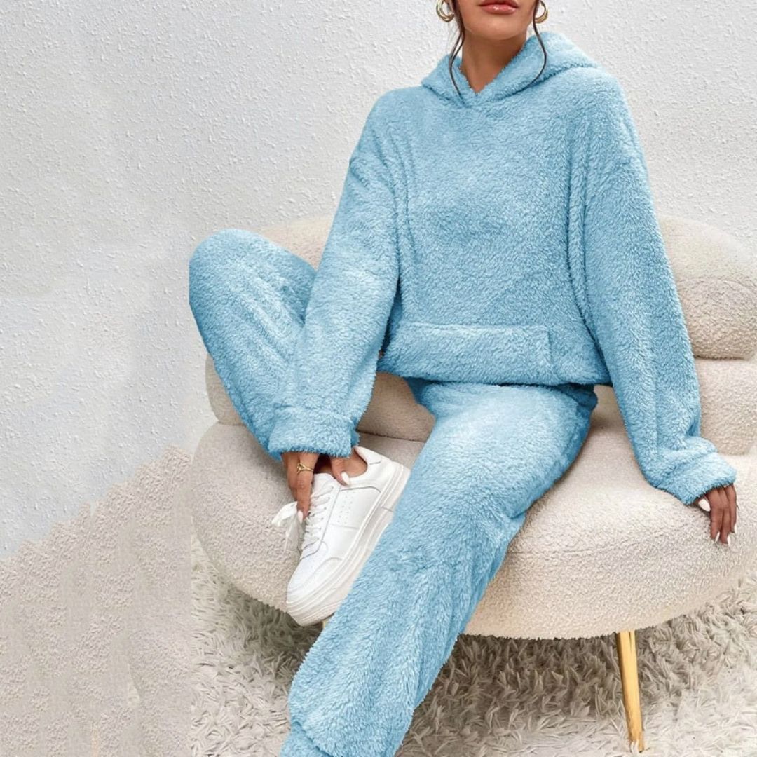 Cozy women's hooded top & lounge pants set in a soft blush pink, perfect for spring casual wear.
