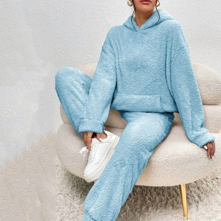 Cozy women's hooded top & lounge pants set in a soft blush pink, perfect for spring casual wear.