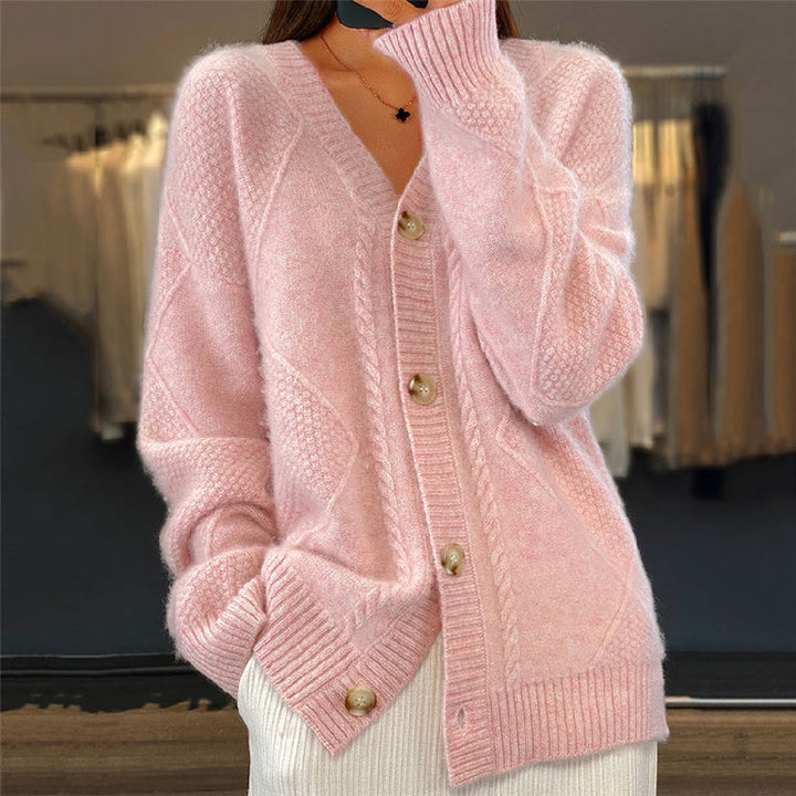 Cozy women's long-sleeved open front knit cardigan in a classic solid color, perfect for layering.