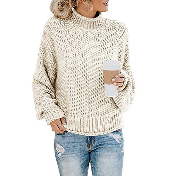 Cozy women's loose-fit turtleneck sweater in a soft knit, perfect for stylish fall and winter casual wear.