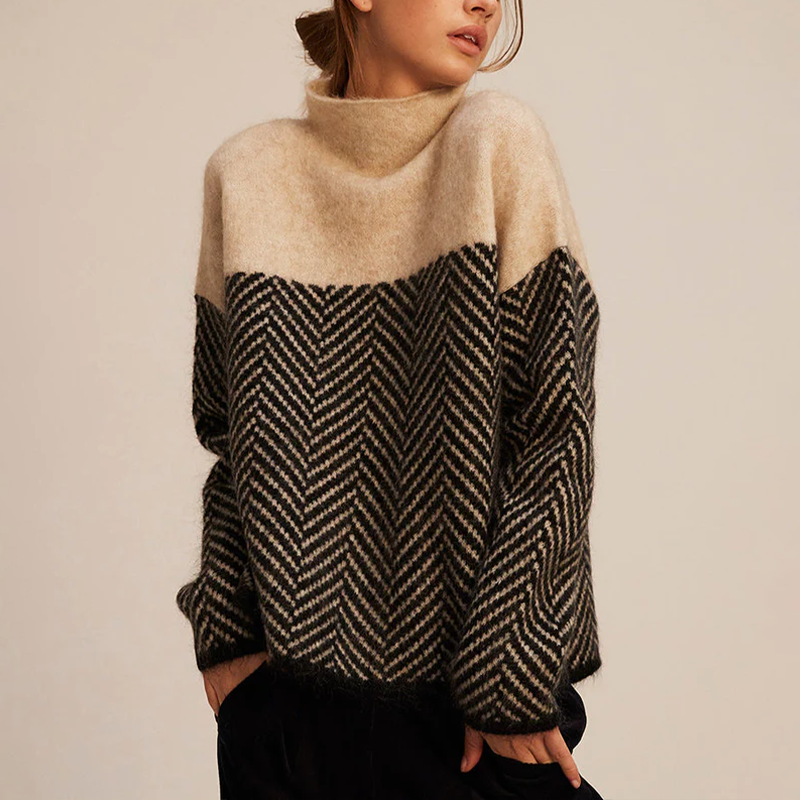 Cozy women's loose knit high collar sweater in a light color, perfect for winter fashion.