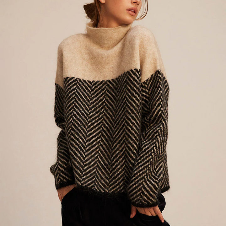 Cozy women's loose knit high collar sweater in a light color, perfect for winter fashion.