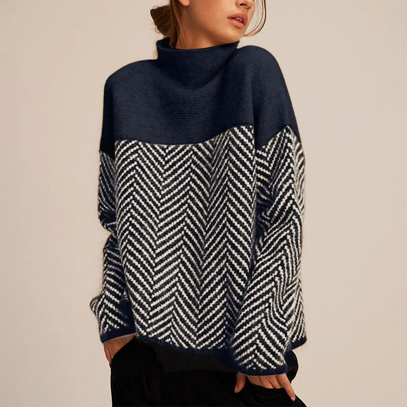 Women's long sleeve loose knit sweater with a prominent high collar, an essential winter wardrobe item.