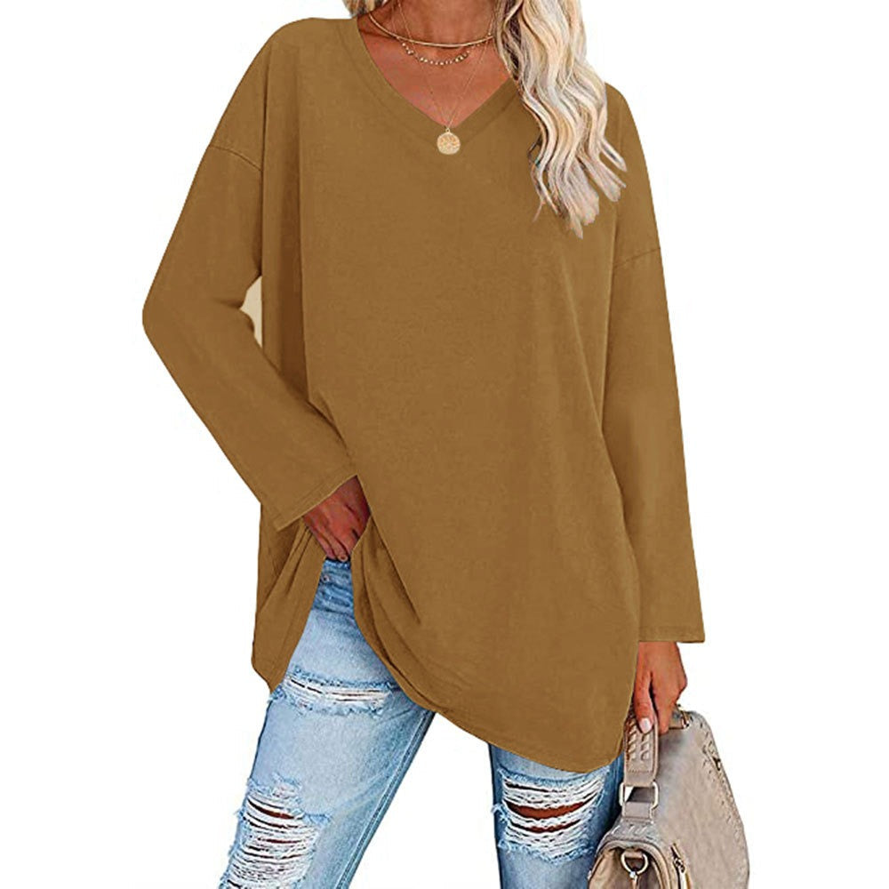 Women's loose oversized knit sweater, offering effortless comfort & chic style.