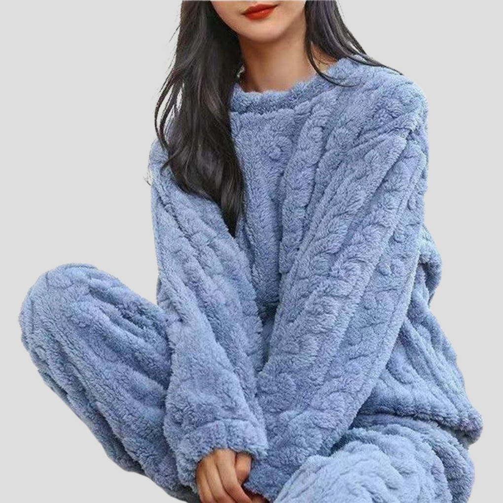 Cozy women's plush fleece pajama set in pink, perfect for warm winter sleepwear and lounging