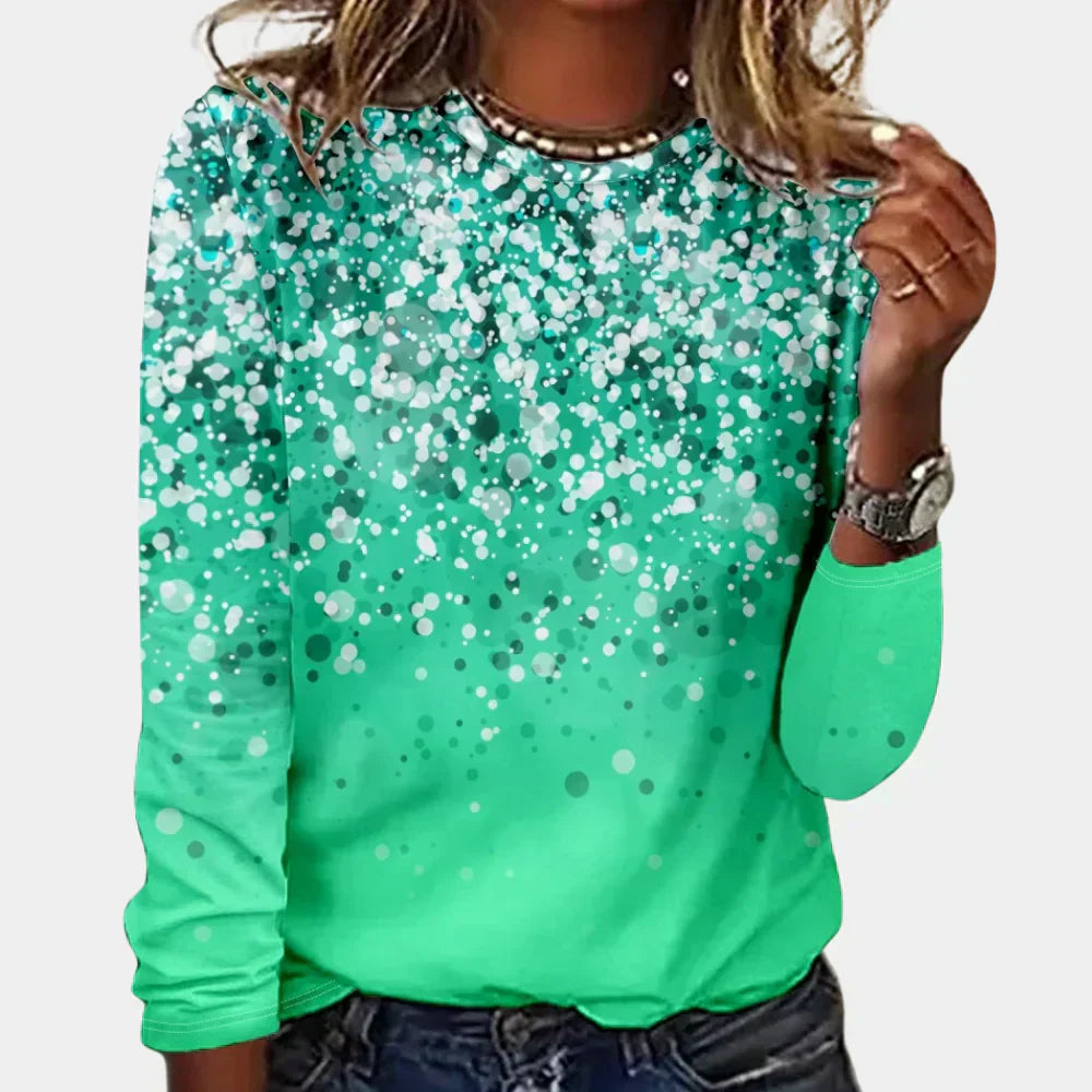 Close-up of a women's festive knit sweater with sparkling stars, ideal winter wear