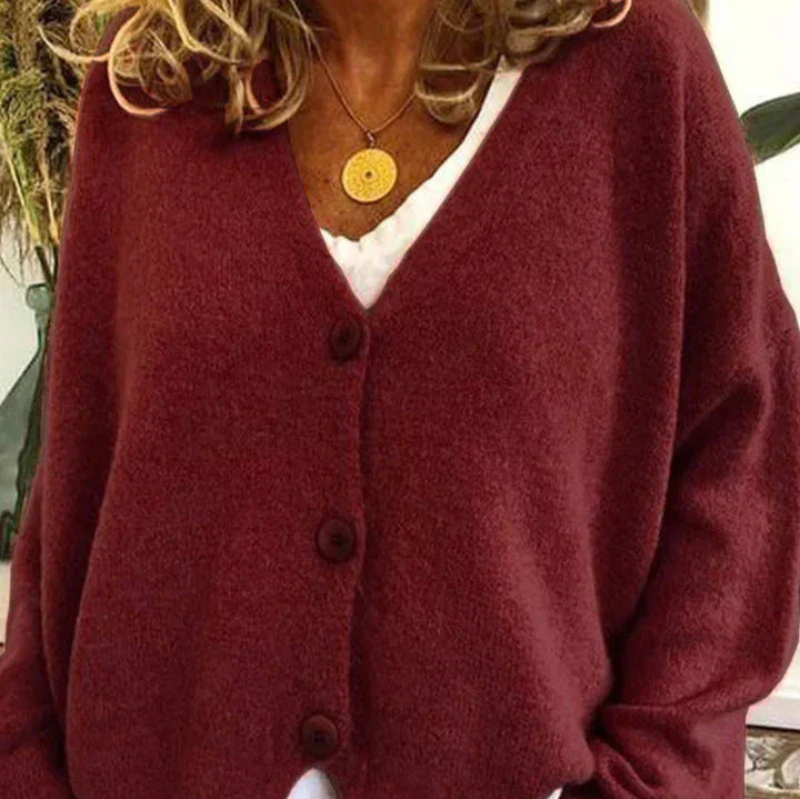 Cozy women's V-neck long-sleeve cardigan, forest green, button-front, fall essential.