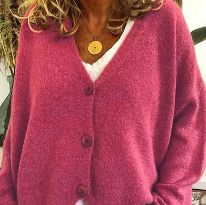 Lightweight women's V-neck button cardigan, beige, ideal for transitional weather.
