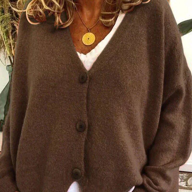Fashionable women's V-neck cozy cardigan, mustard yellow, adds a pop of color.