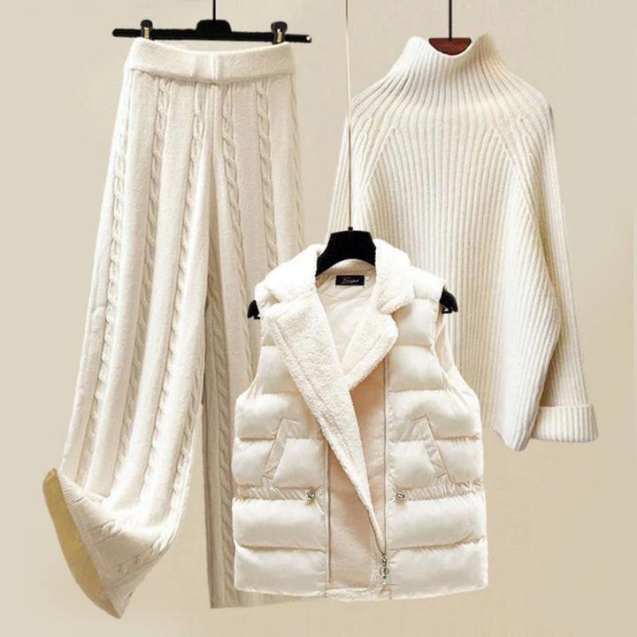 Cozy women's winter top and bottom loungewear set in soft cream, perfect for warm, comfortable attire