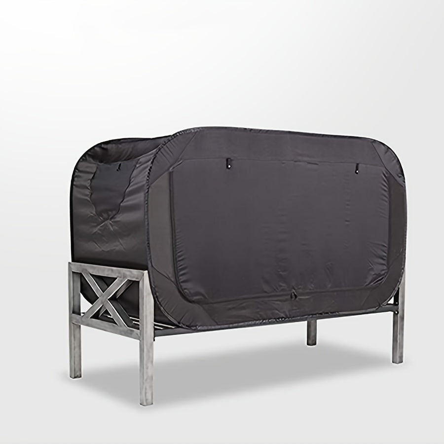Black CozyNest folding tent bed, a versatile portable sleep solution for camping, travel, or indoor privacy.