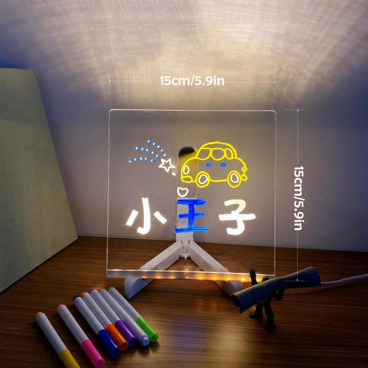 Clear acrylic LED message board with wooden base, functioning as a night light & erasable display.