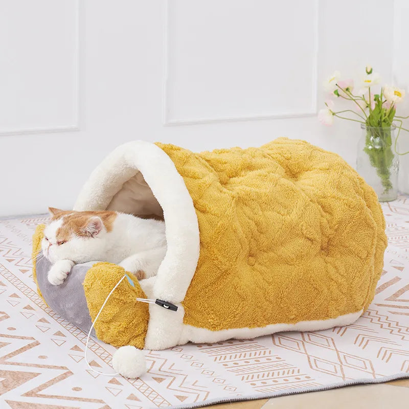 Cushioned cat bed with playful toy for ultimate comfort and fun. Perfect cozy sleeping pad for pets.