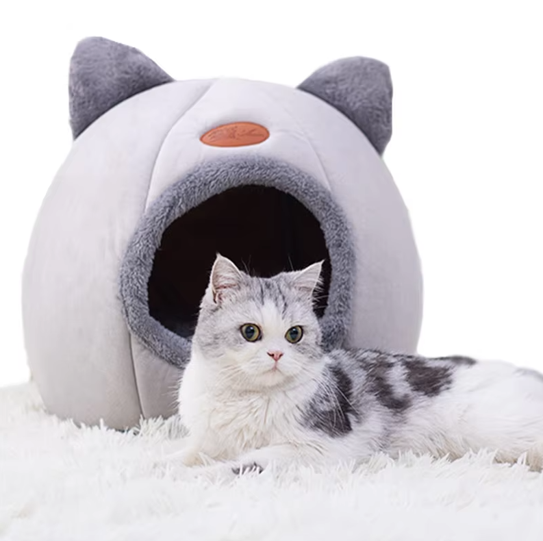 Cute cat-shaped warming pet bed with removable cushion for ultimate feline comfort and warmth.