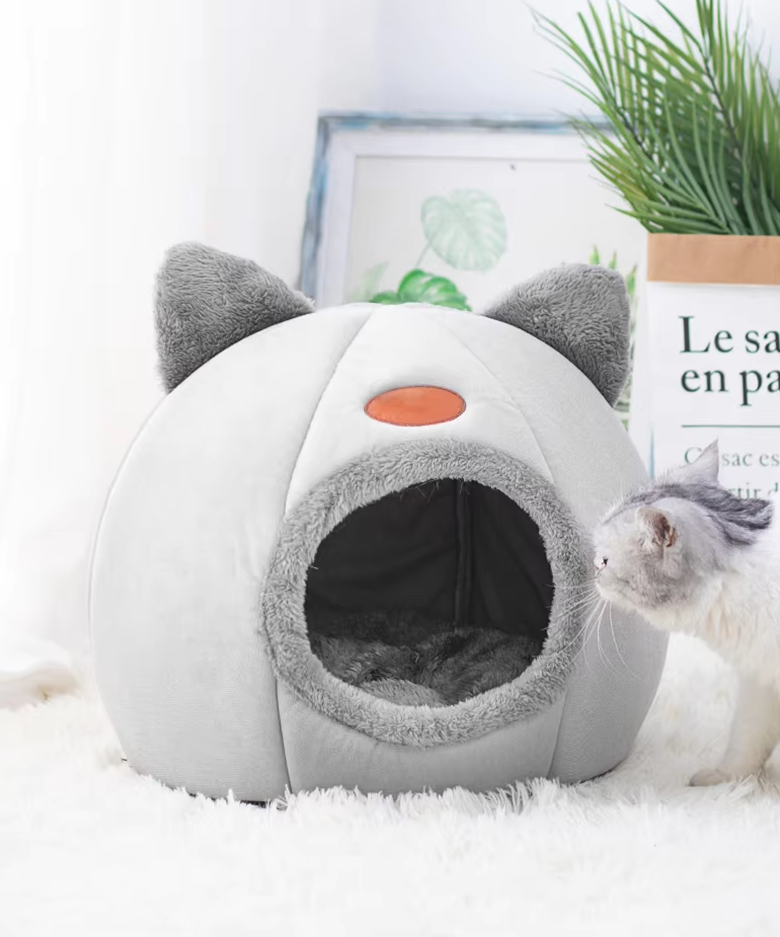 Super soft, cuddly cat-shaped warming bed. Ideal cozy pet bed for cats and small dogs.