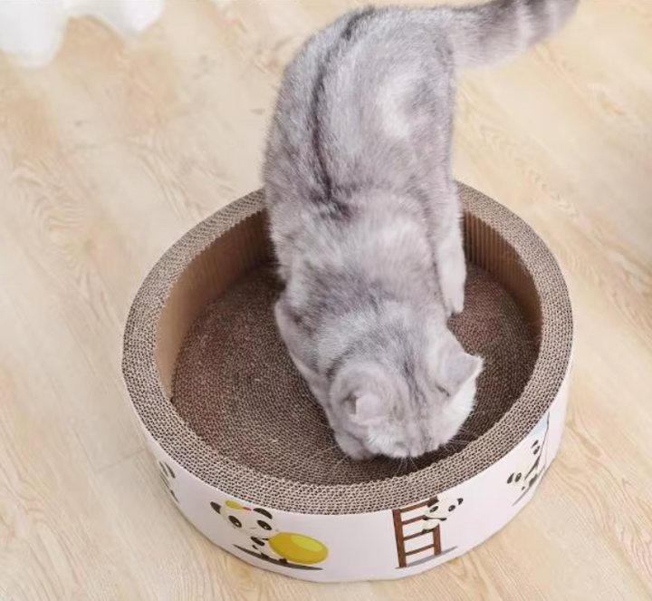 Round sisal cat scratching mat, a durable toy for feline claw care & furniture protection.