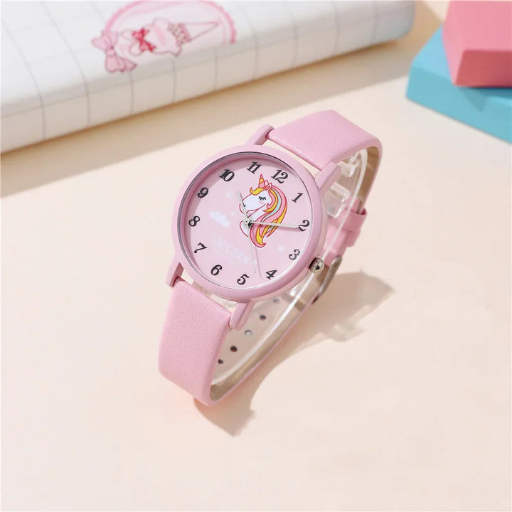 Close-up of a pink unicorn children's watch with a playful cartoon dial and a soft, adjustable PU leather band.