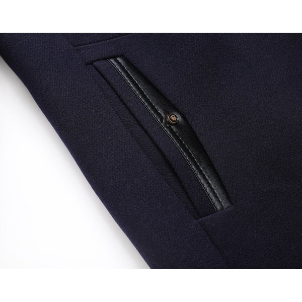 Detail of buttons on a men's dapper winter wool blend mid-length coat, elegant design