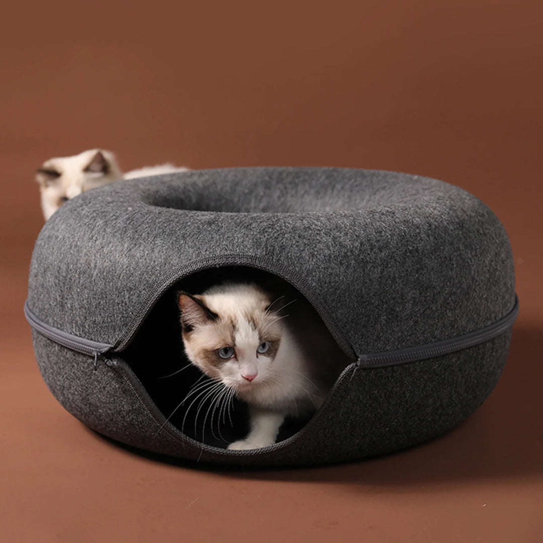 Dark grey cozy cat cave bed for feline comfort and a pet hideaway. Perfect for stress relief.