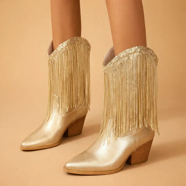 Glamorous sequin cowboy boots for women, featuring dazzling fringe. Ideal statement footwear for parties & festivals.