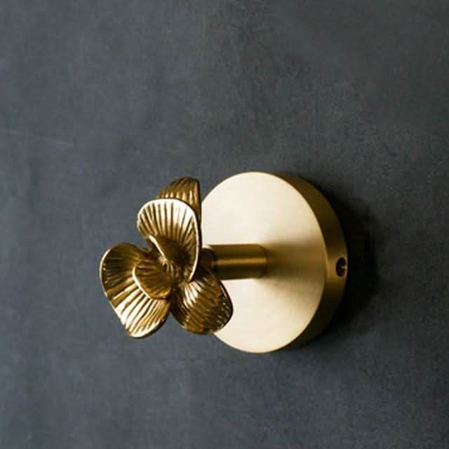 Handcrafted brass animal wall organization rack with subtle gold accents, perfect for keys.