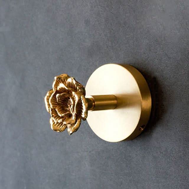 Versatile brass animal wall rack with gold finishing, suitable for entryway, bedroom or bathroom.