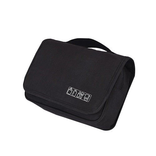 Hanging travel toiletry bag with multiple compartments, ideal for bathroom organization.