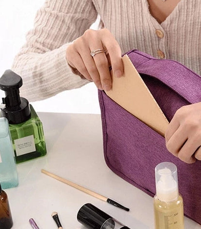 Men's deluxe hanging toiletry bag, perfect for grooming essentials on business trips.