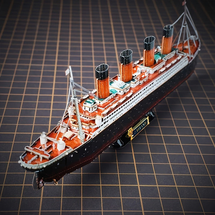 Hands meticulously assembling the intricate Titanic 3D metal model kit, a fun DIY historical craft project.