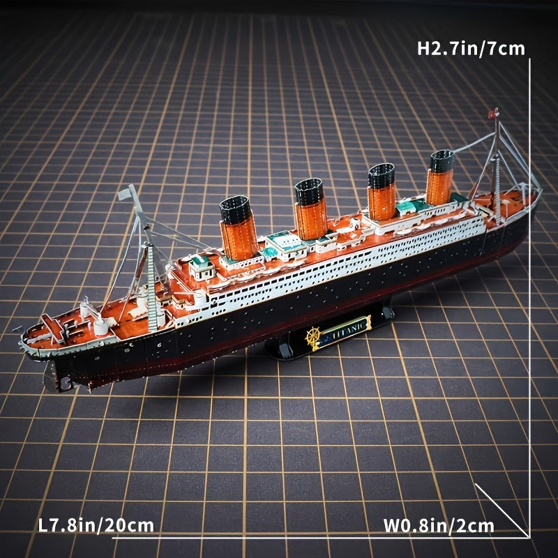 Titanic 3D metal model kit next to a hand, highlighting the detailed miniature scale replica.