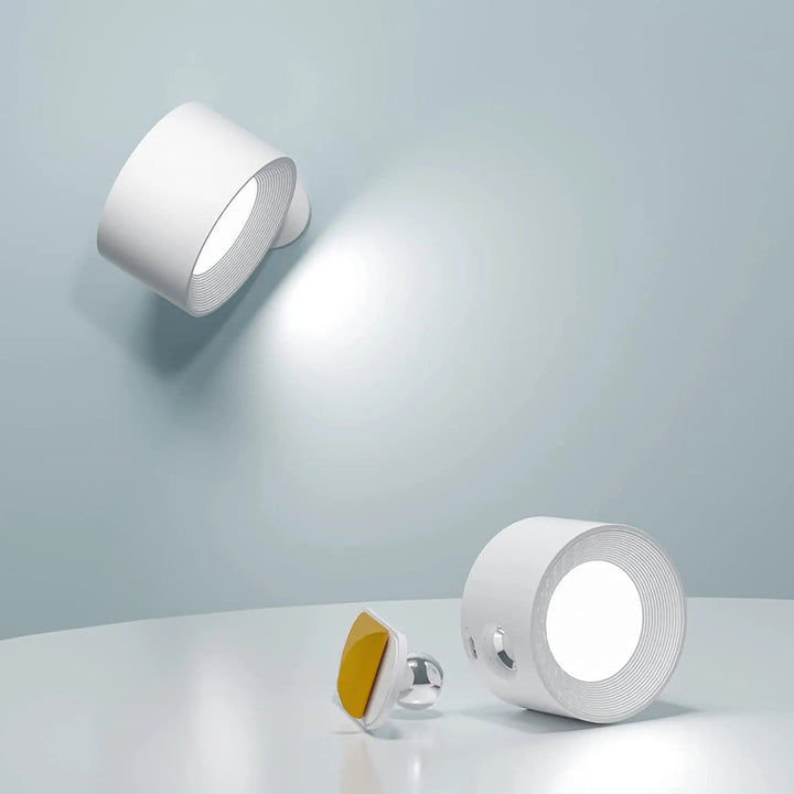 Dimmable wireless LED wall light, magnetic & rechargeable, providing modern home ambiance.