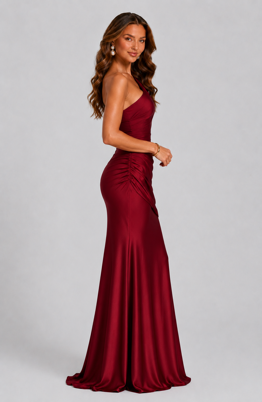Modern one-shoulder women's maxi dress with an elegant draped waist detail. Great for a sophisticated casual chic look.