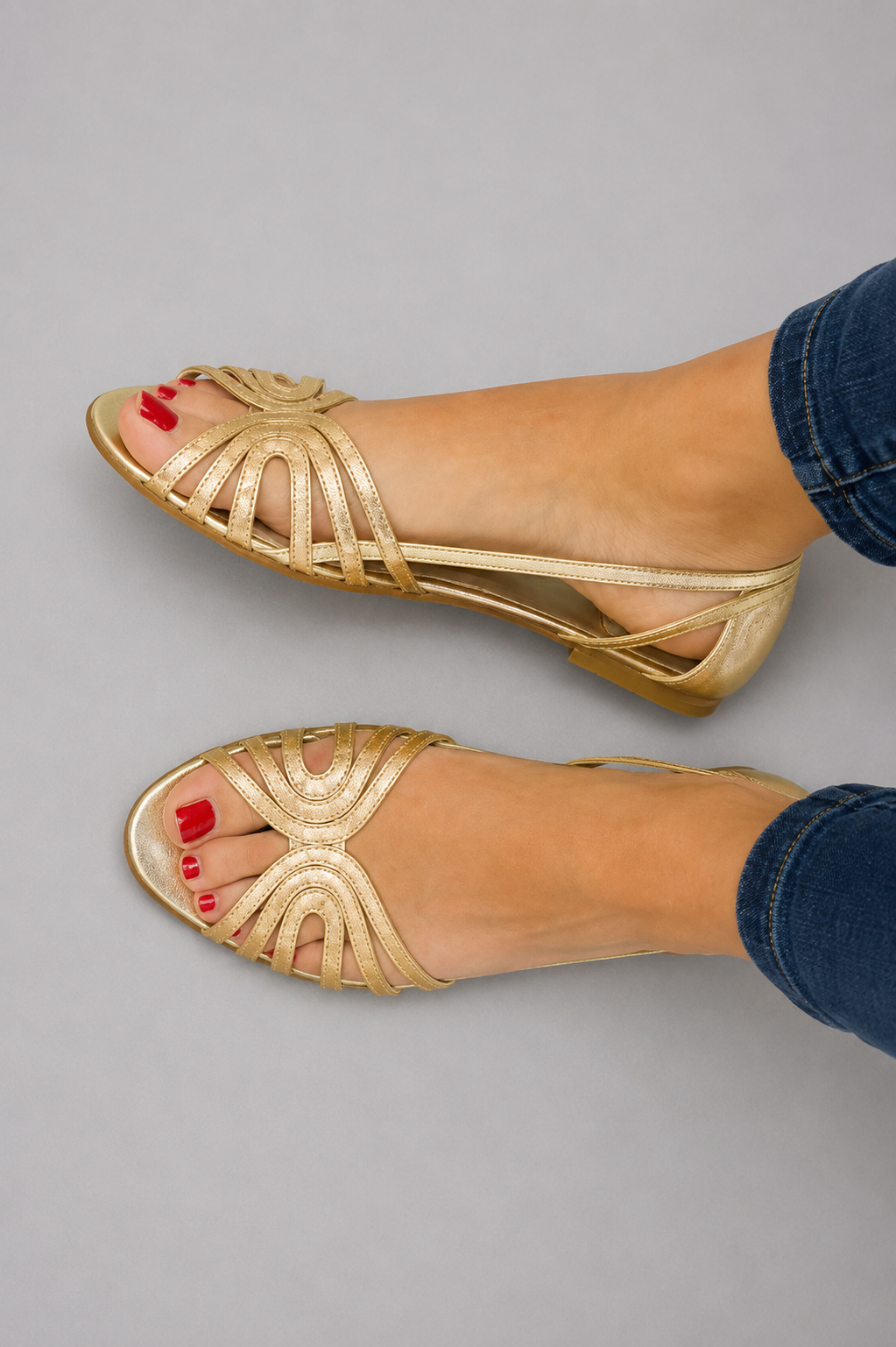 Chic golden flat slip-on sandals for women, offering ultimate summer comfort for beach & casual wear.