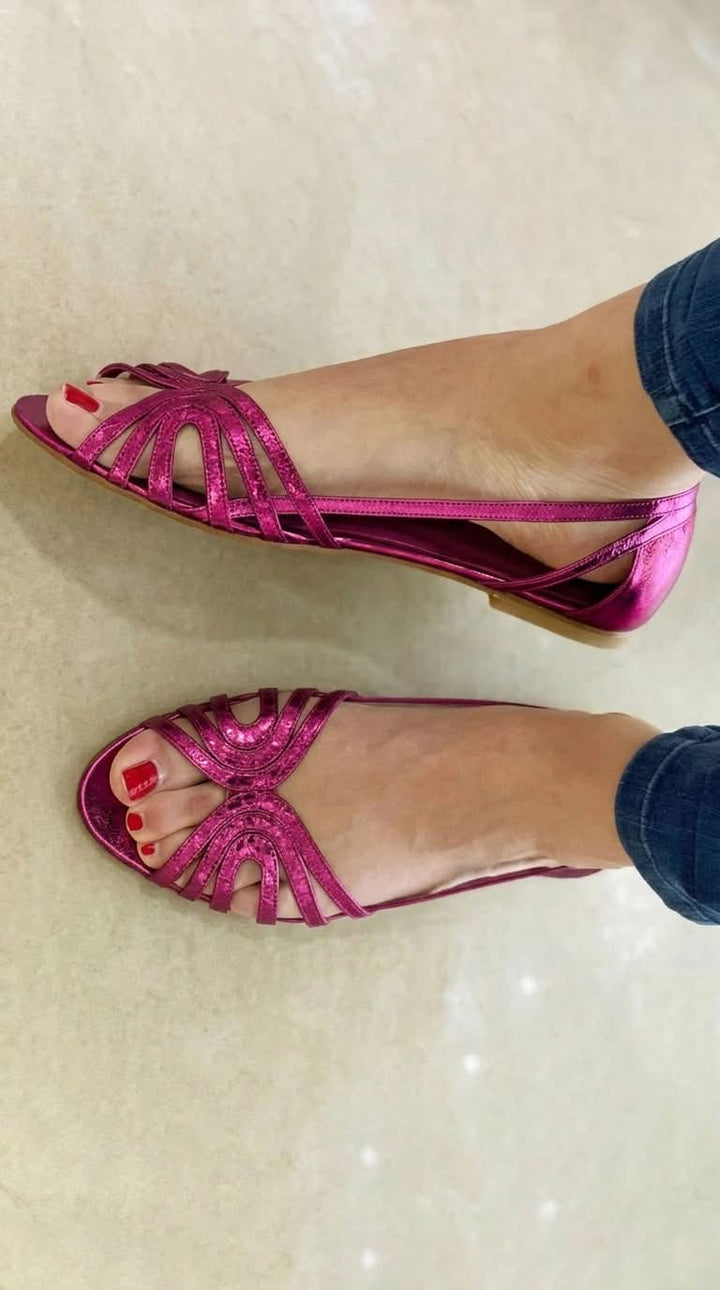 Comfortable open-toe golden slip-on sandals for women, essential stylish summer casual footwear.