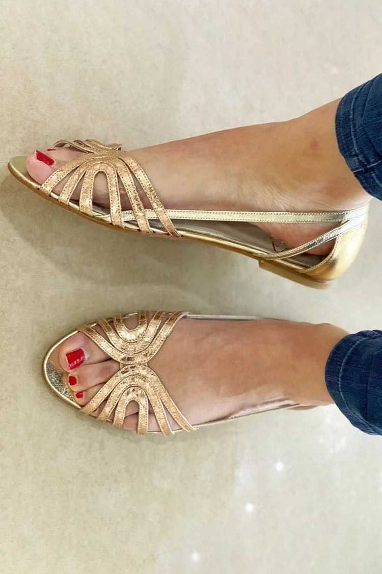 Golden slip-on women's summer sandals, perfect for comfortable warm-weather casual wear.