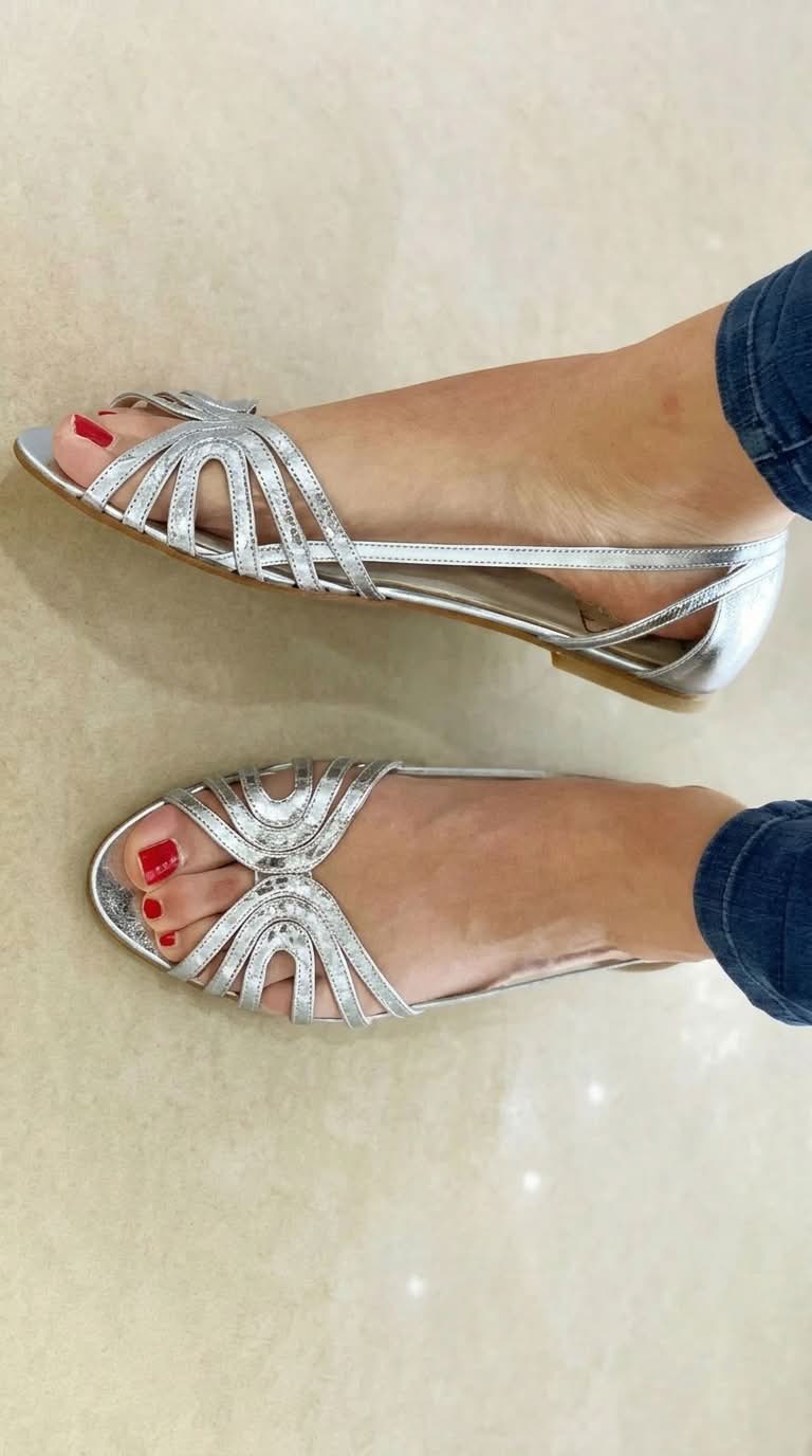 Elegant golden flat sandals for women, ideal slip-on summer footwear for beach and vacation comfort.