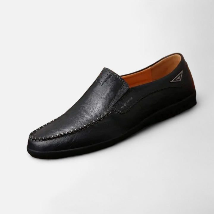 Premium men's formal & casual loafers, offering superior comfort and a sophisticated stitched design.