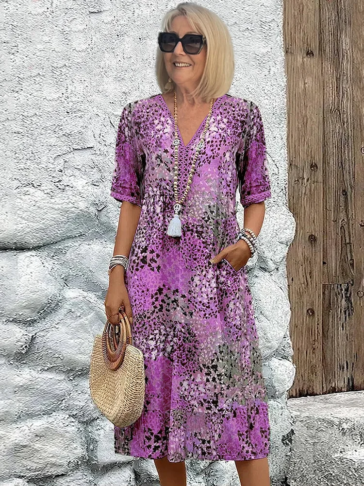 Comfortable beige A-line midi dress, vibrant and flowy for women. Flattering tummy coverage, ideal for summer.