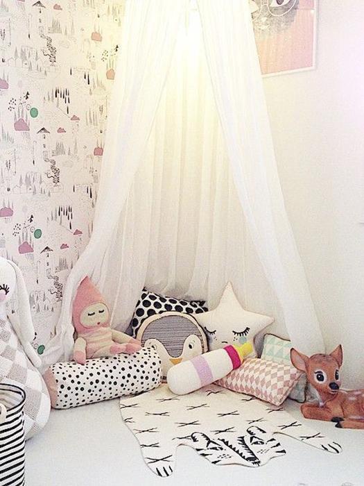Cozy cotton & chiffon bed tent canopy, perfect play space or reading nook for a child's dreamy bedroom decor.