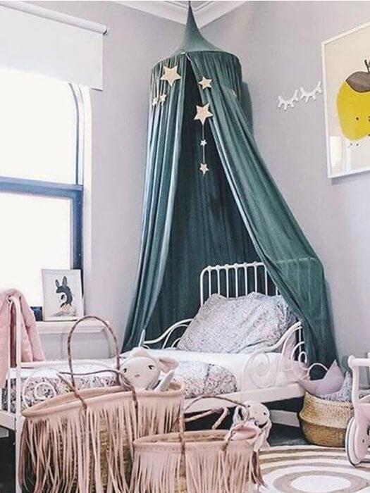 Billowing chiffon & cotton bed canopy, creating a whimsical & magical nursery or kids' room decor. Dreamy play tent.