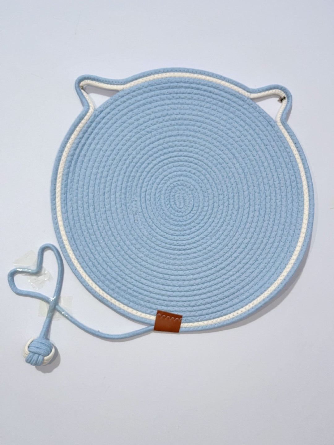 Stylish cat scratch pad rug, a modern pet accessory designed for healthy claws & effective furniture protection.